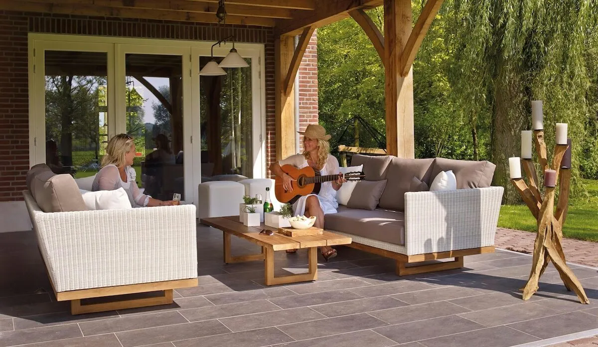 Outdoor living area with covered patio and garden furniture - extending your living space outdoors with a rear extension in Dublin